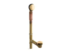 Brass toe tap bath drain