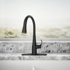 Compact pull-down kitchen sink faucet with three-function sprayhead