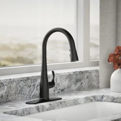 Compact pull-down kitchen sink faucet with three-function sprayhead