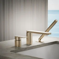 Deck-mount bath faucet with handshower