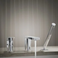 Deck-mount bath faucet with handshower