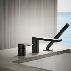 Deck-mount bath faucet with handshower