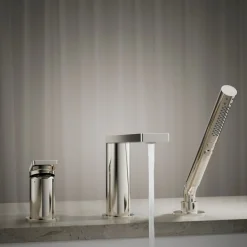 Deck-mount bath faucet with handshower