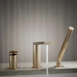 Deck-mount bath faucet with handshower