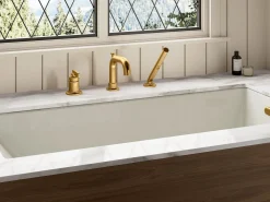 Deck-mount bath faucet with handshower