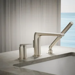 Deck-mount bath faucet with handshower
