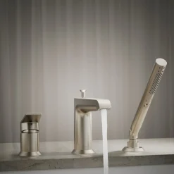 Deck-mount bath faucet with handshower
