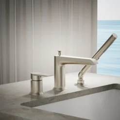 Deck-mount bath faucet with handshower