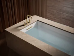 Deck-mount bath spout