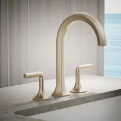 Deck-mount bath spout with Cane design
