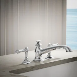 Deck-mount bath spout with flare design