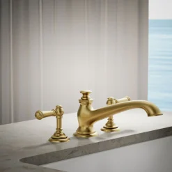Deck-mount bath spout with flare design