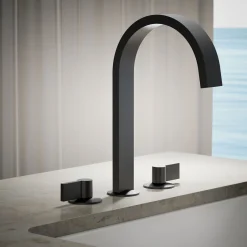 Deck-mount bath spout with Ribbon design