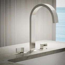 Deck-mount bath spout with Ribbon design