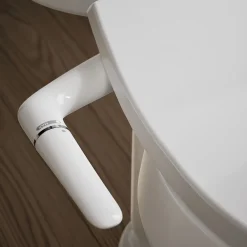 Elongated manual bidet toilet seat