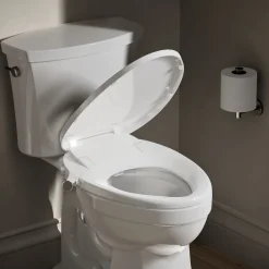 Elongated manual bidet toilet seat