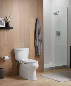 Elongated manual bidet toilet seat