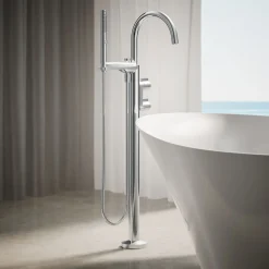 Floor-mount bath filler trim with lever handles and handshower
