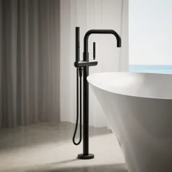 Floor-mount bath filler trim with handshower