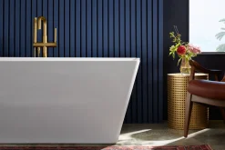 Floor-mount bath filler trim with handshower