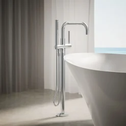 Floor-mount bath filler trim with handshower
