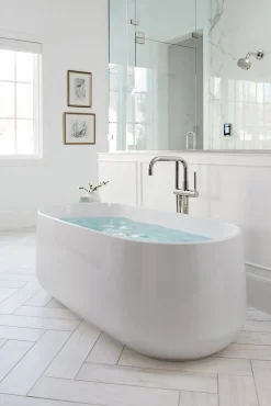 Floor-mount bath filler trim with handshower