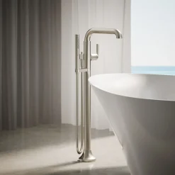 Floor-mount bath filler trim with handshower