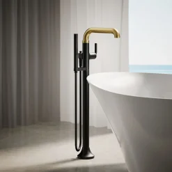 Floor-mount bath filler trim with handshower