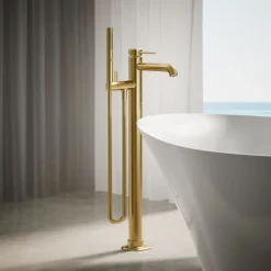Floor-mount bath filler trim with handshower