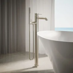 Floor-mount bath filler trim with handshower