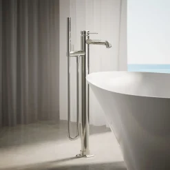 Floor-mount bath filler trim with handshower