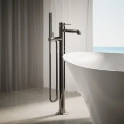 Floor-mount bath filler trim with handshower