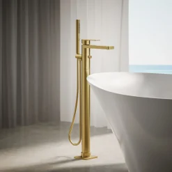 Floor-mount bath filler trim with handshower