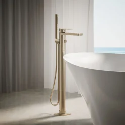 Floor-mount bath filler trim with handshower