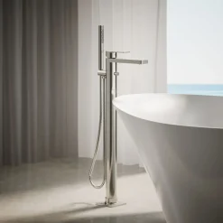 Floor-mount bath filler trim with handshower