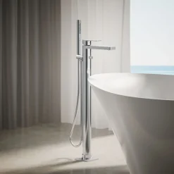Floor-mount bath filler trim with handshower