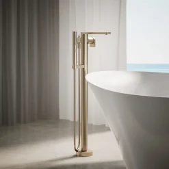 Floor-mount bath filler trim with handshower