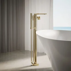 Floor-mount bath filler trim with handshower