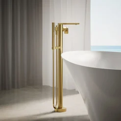 Floor-mount bath filler trim with handshower