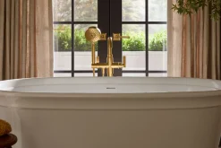 Floor-mount bath filler trim with handshower
