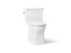 Hidden cord two-piece elongated toilet with skirted trapway, 1.28 gpf