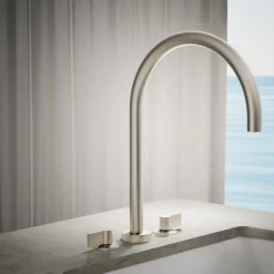 Laminar deck-mount non-diverter bath spout
