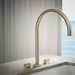 Laminar deck-mount non-diverter bath spout