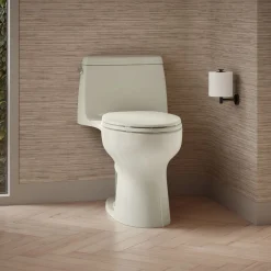 One-piece compact elongated 1.6 gpf toilet with Revolution 360® swirl flushing technology