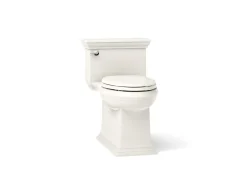 One-piece compact elongated toilet with skirted trapway, 1.28 gpf
