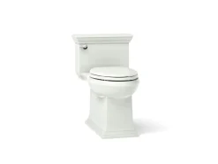 One-piece compact elongated toilet with skirted trapway, 1.28 gpf