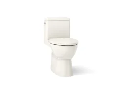 One-piece compact elongated toilet with skirted trapway, 1.28 gpf