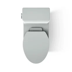 One-piece compact elongated toilet with skirted trapway, 1.28 gpf