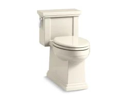 One-piece compact elongated toilet with skirted trapway, 1.28 gpf