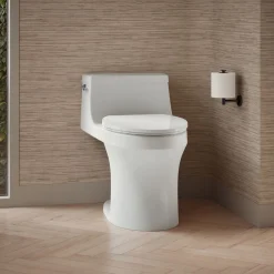 One-piece compact elongated toilet with concealed trapway, 1.28 gpf
